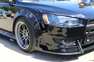 a car with low suspension as one of the custom auto body services available