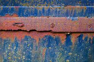 rusted and weathered surface of a truck that needs restoration