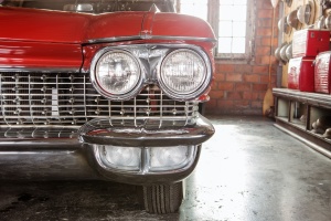 a red car head lights with Car Restoration done 