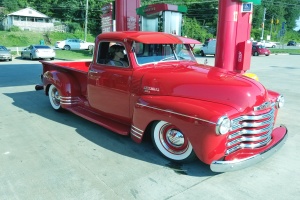 a red truck that has a truck restoration done