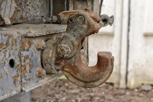 rusted tow hitch attached needing truck frame repair