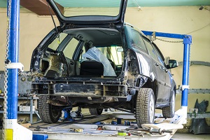 car in a body shop to Swap an Engine